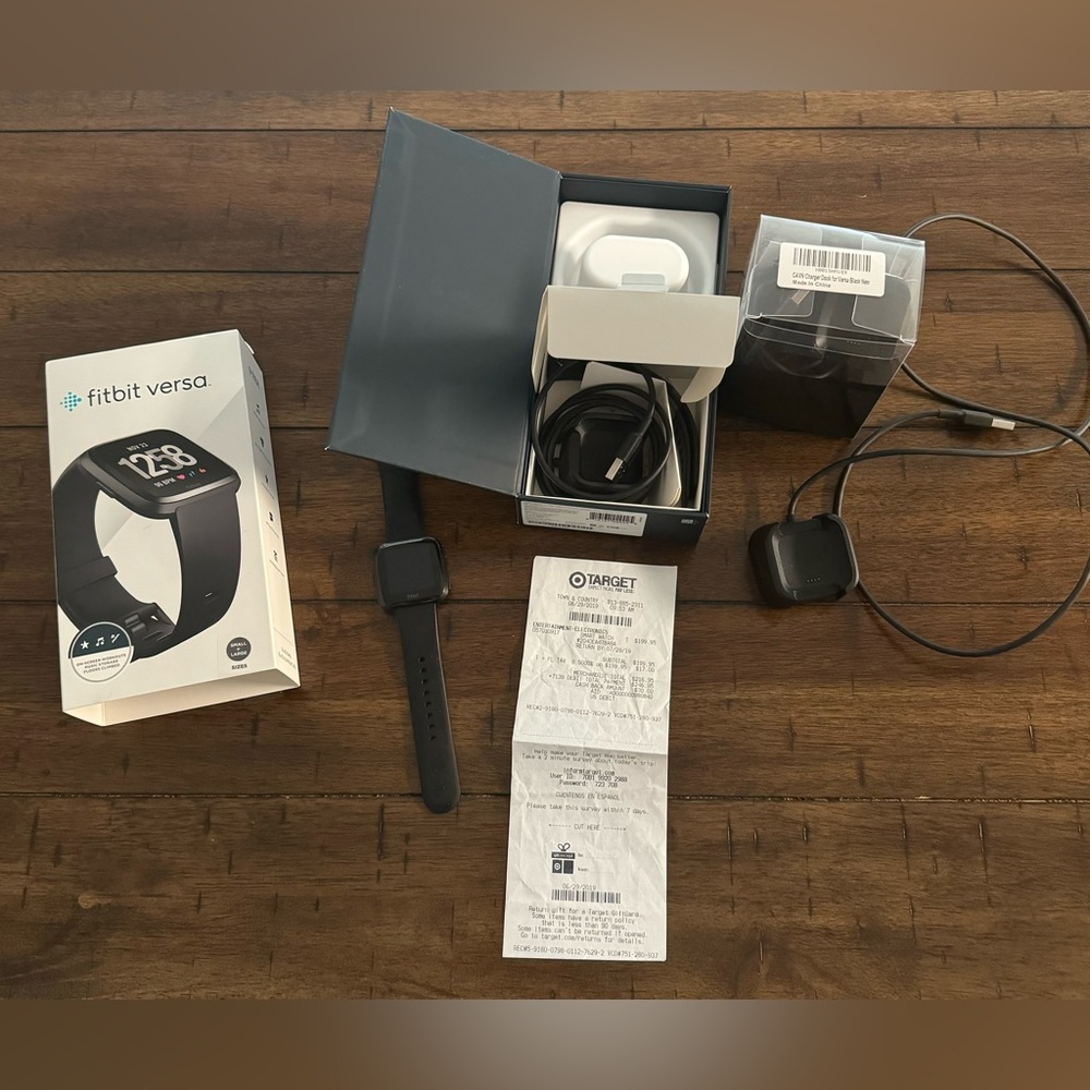 Fitbit Versa with 3 chargers